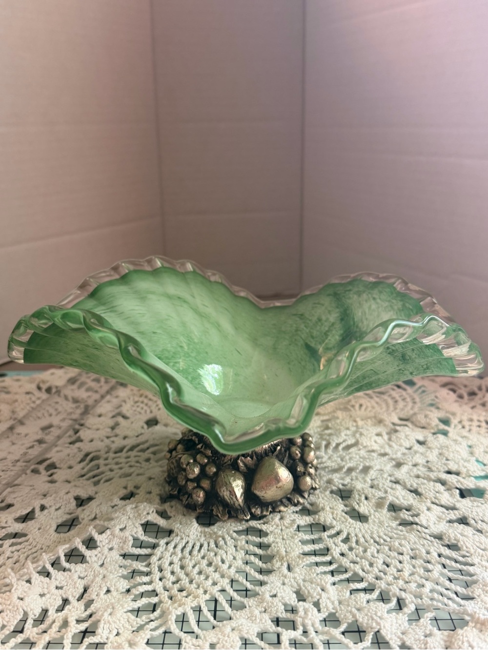 Ruffled, green bowl with silver tone base